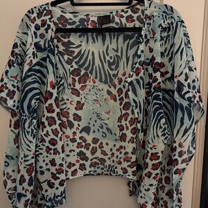 Stylish Leopard Print Blouse with Blue and Red Highlights